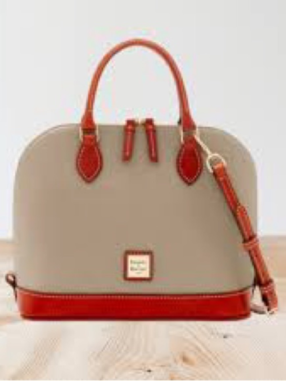 Dooney & Bourke Beige Satchel with Red Trim